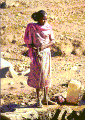 Vrouw bij waterput